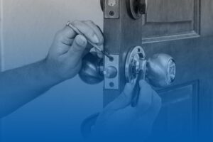 Image of a locksmith working on a lock.