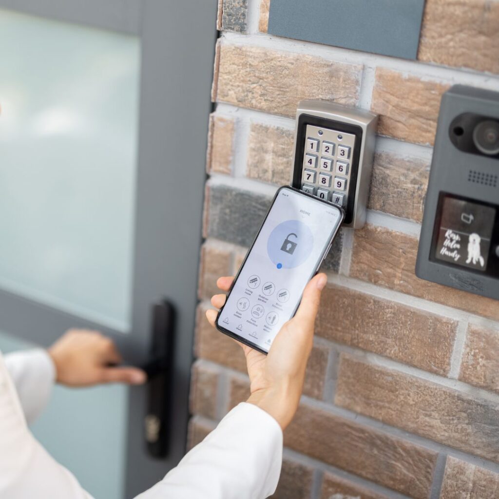 Person unlocking an electronic door with their phone