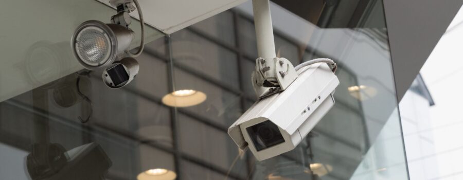 cctv camera suspended from building