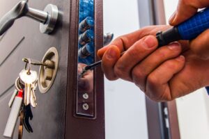 a locksmith unlocking a door
